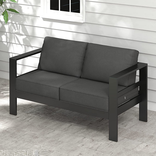 Ebern Designs CalvinDaniel 53'' Wide Outdoor Loveseat with Cushions